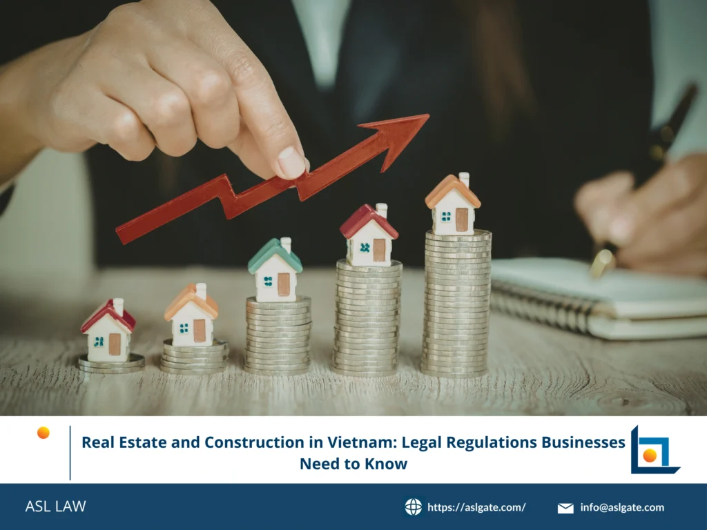 ASL LAW real estate and construction lawyers reviewing new legal regulations with client at Ho Chi Minh City office